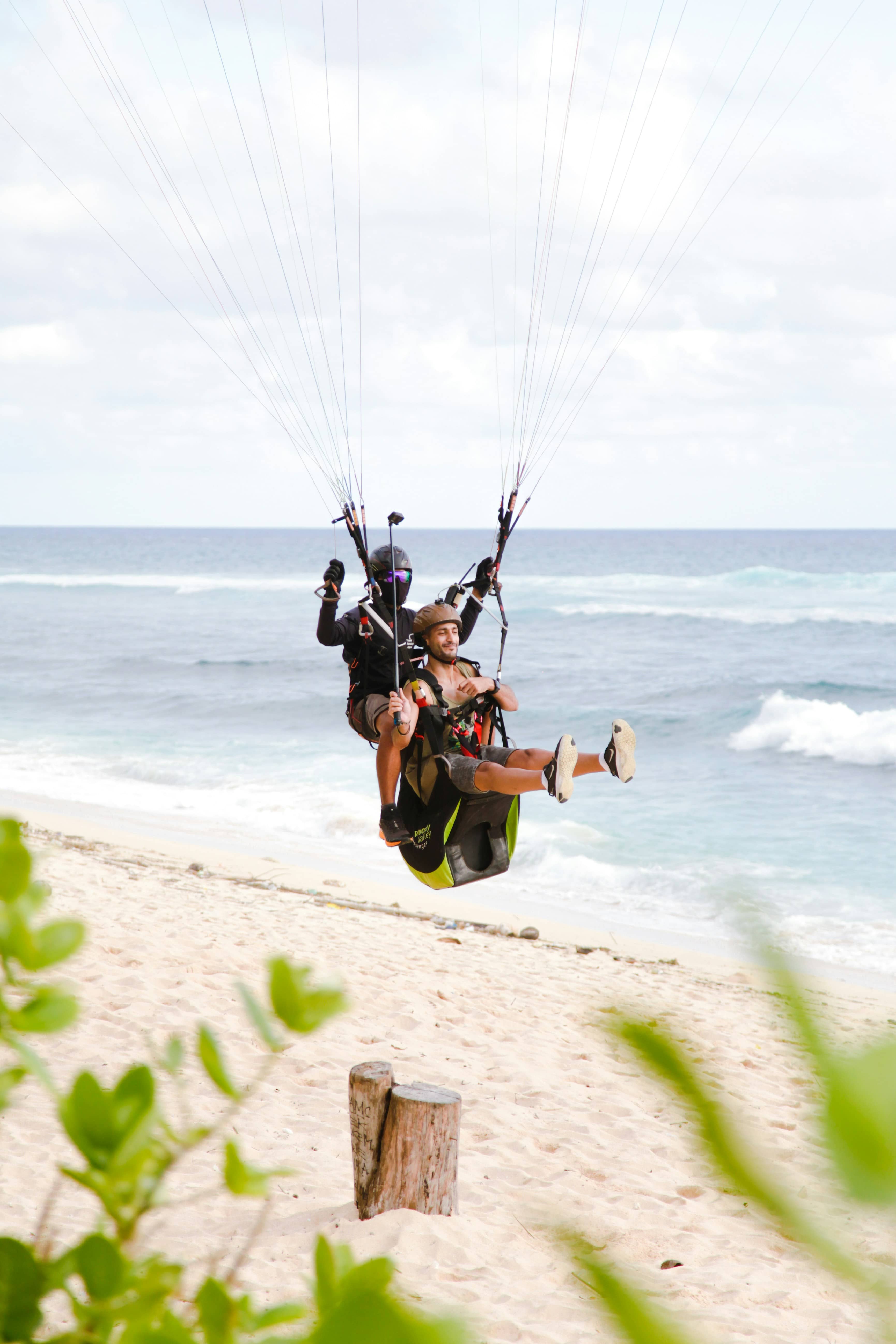 Paragliding over the cliffs of Pecatu, Uluwatu, Bali
