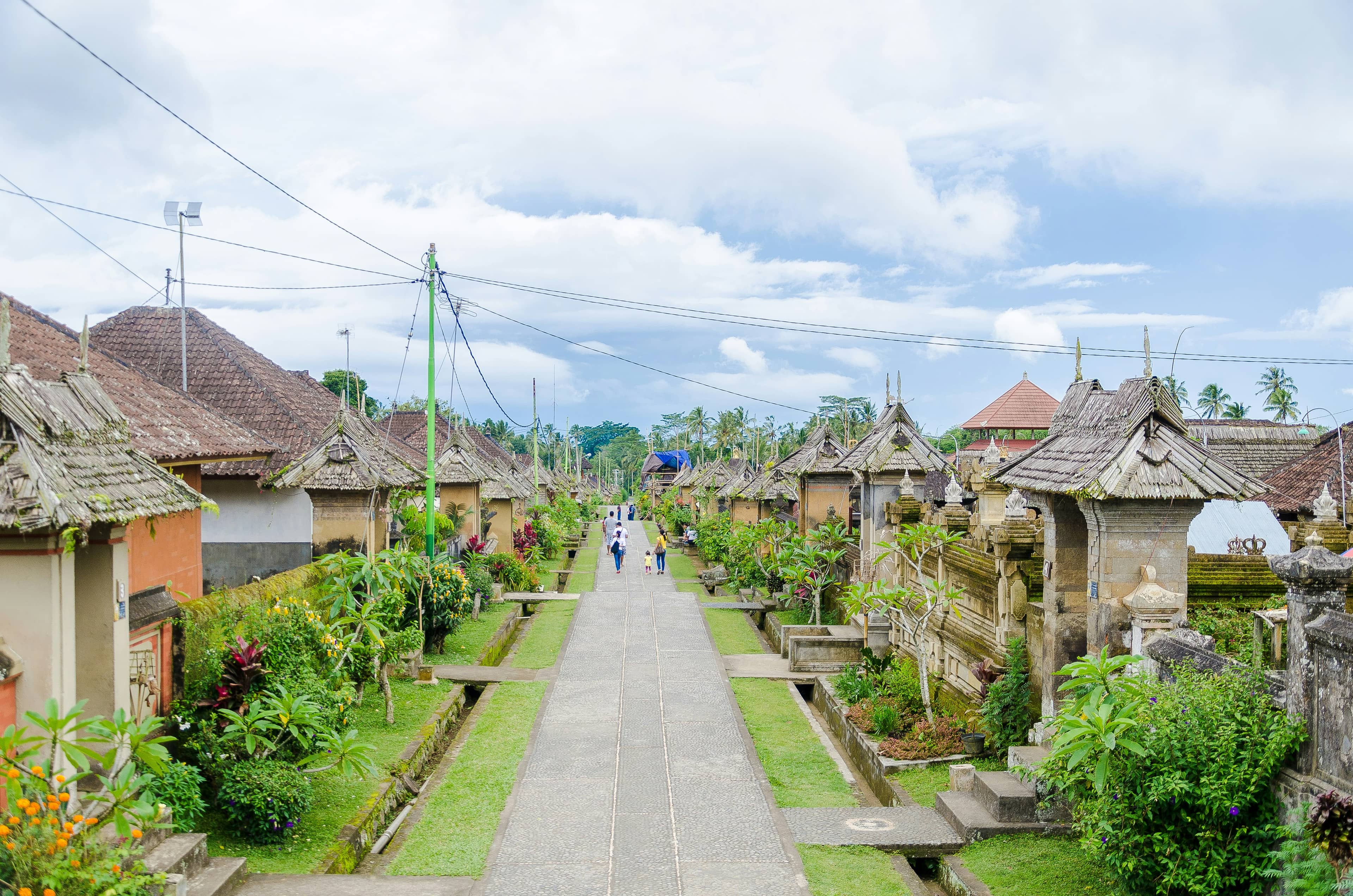 A narrow stone-walled lane in Penglipuran Village, Bangli, Bali